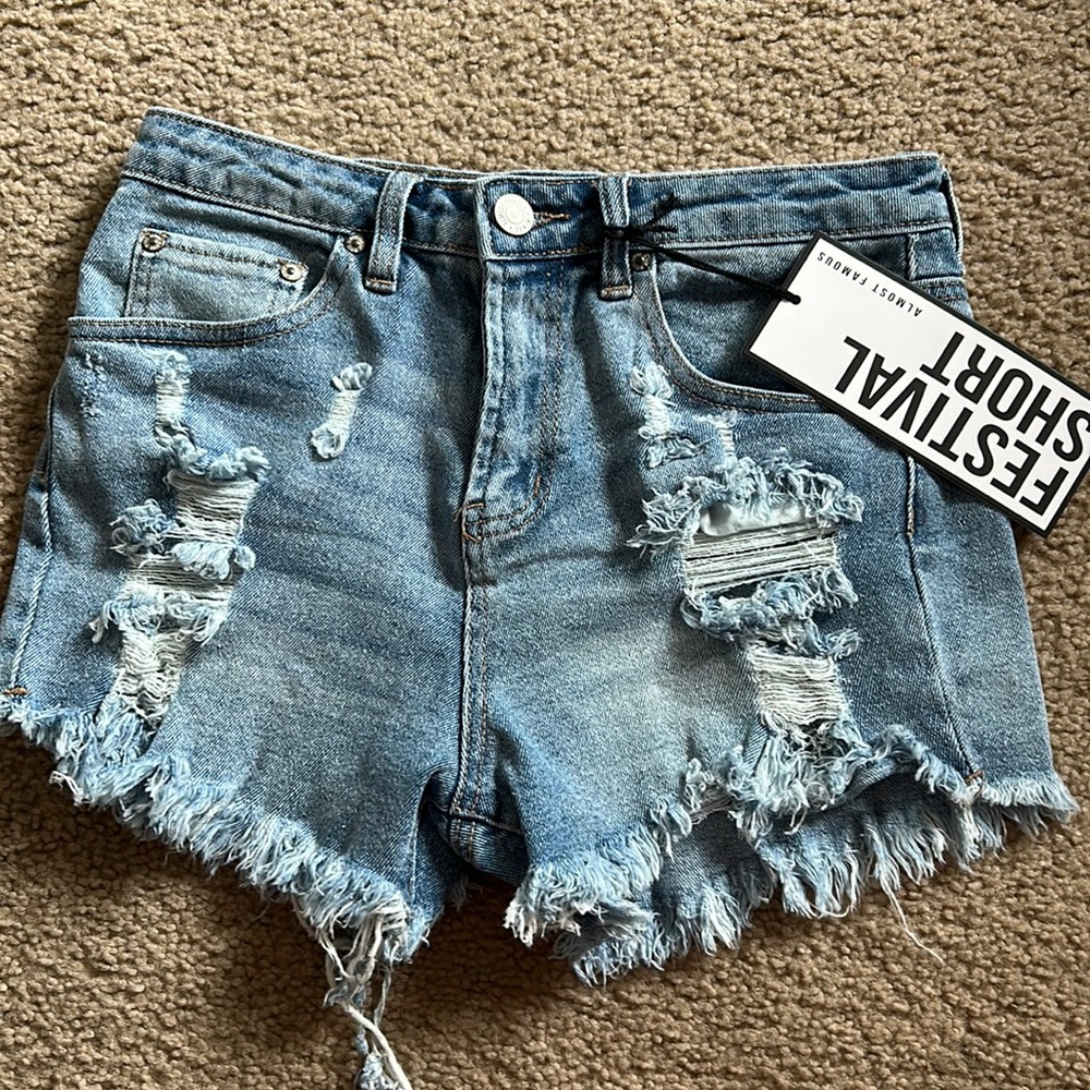 NWT ripped jean shirt size 5